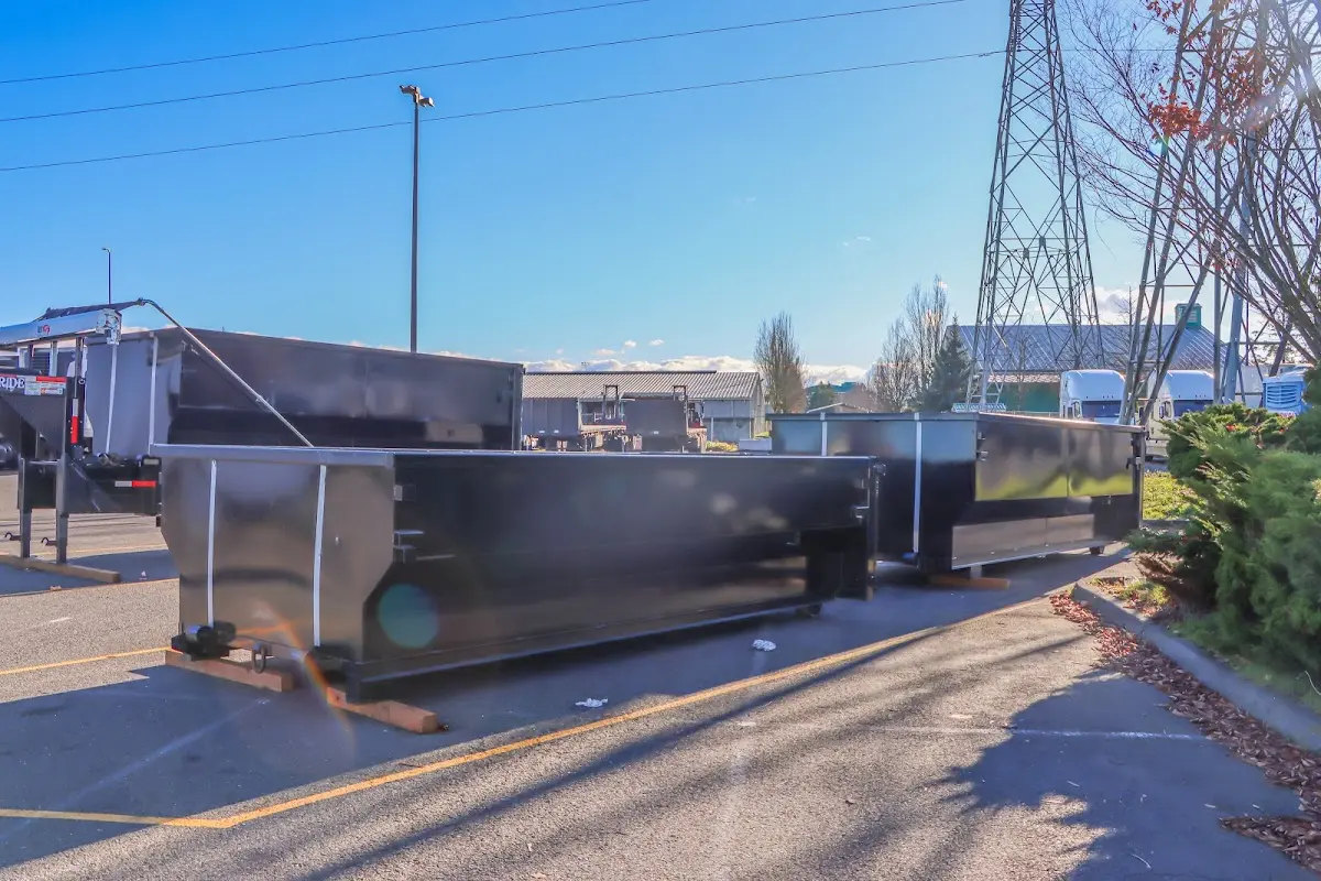 Roll-off dumpster ready for waste disposal at job site for Construction Dumpster Rental in Amityville